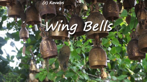Bronze Bells Hanging from a Tree