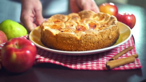 Homemade Apple Pie on Kitchen Table Close Up
