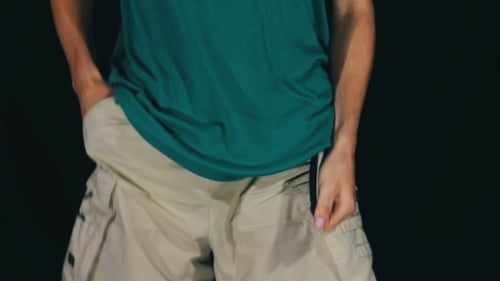 Man Turns The Empty Pockets Of His Shorts. No Money