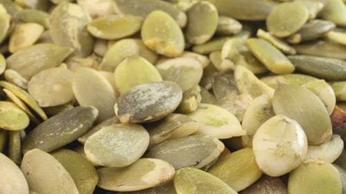 Close-up of Fresh, Pale Green Pumpkin Seeds