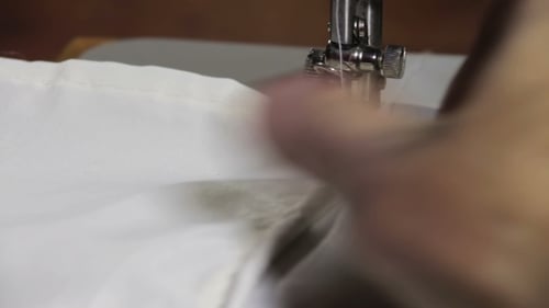 Sewing Machine Stitching White Fabric Seam Close Up