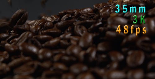 Coffee Beans Falling in a Pile Close Up