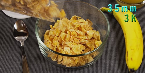 Adding Cereal Flakes to Glass Bowl