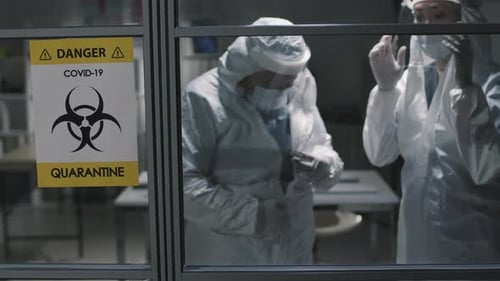 Doctors In Protective Costumes In Covid-19 Zone