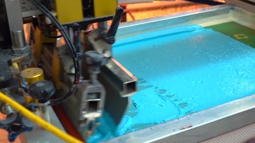 Silk Screening Machine Applying Blue Ink