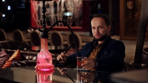 Young Intelligent Man Smoking Hookah