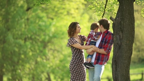 Family Togetherness in a Beautiful Green Park