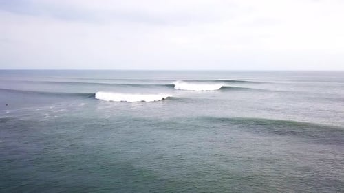 Flying over Ocean by Coast of Bali