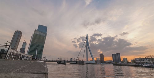 Sunset over Modern Bridge City Skyline