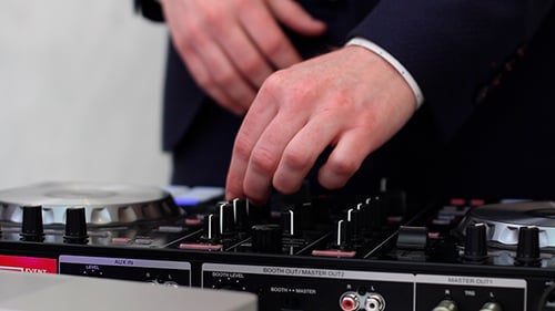 DJ Mixing Music at Corporate Event