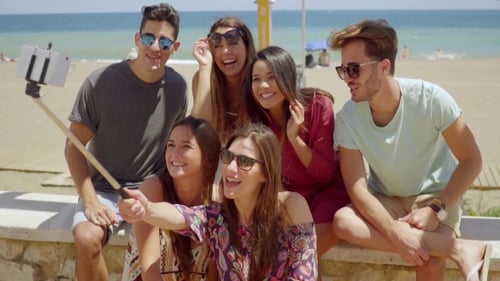 Friends Taking Selfie on Beach During Sunny Day