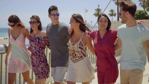 Cheerful Friends Walk Together near Beach on Summer Day