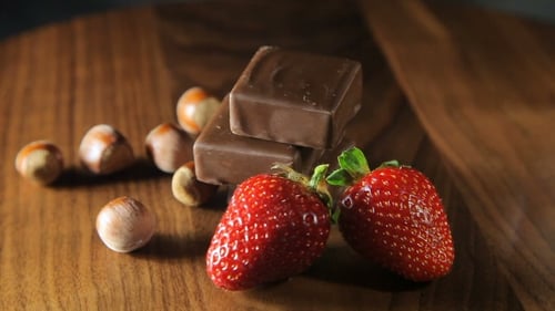 Close up of Chocolate, Strawberries, and Hazelnuts