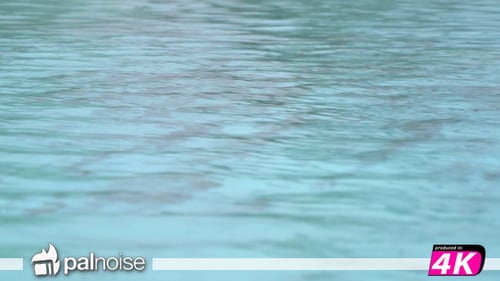 Translucent Blue Water Waves in Tropical Ocean