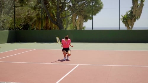 Woman Playing Tennis on Tropical Court, Celebrating Victory
