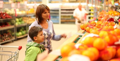 Mother And Son With Fruit