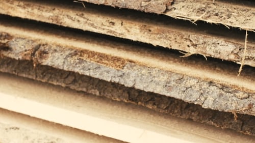 Close Up of Stacked Wood Planks and Logs