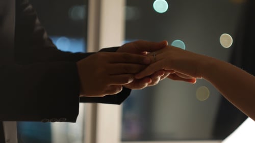 Romantic Engagement Ring Placement at Night