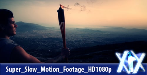 Man on Mountain Peak Holds a Burning Torch