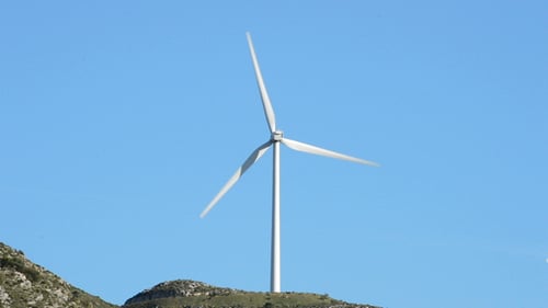 Wind Turbine Energy Moving at Sunny Day