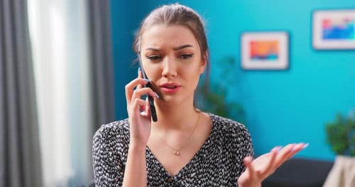 Woman Talking on Smartphone in Home Interior