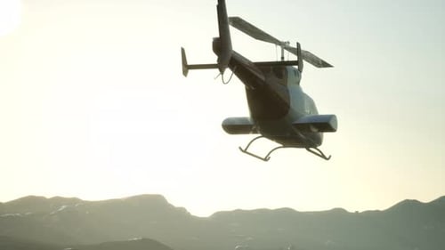 Realistic 3D Helicopter Flying Over Mountain Landscape at Sunset
