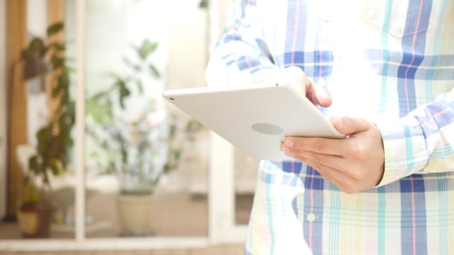 Designer Using Tablet Outdoor