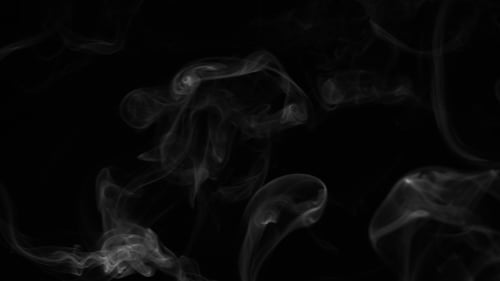 White Smoke Billowing on Black Background