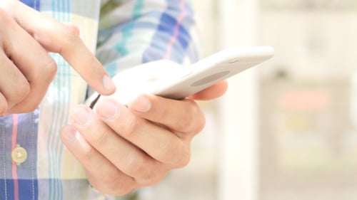 Hands Using White Smartphone, Close Up