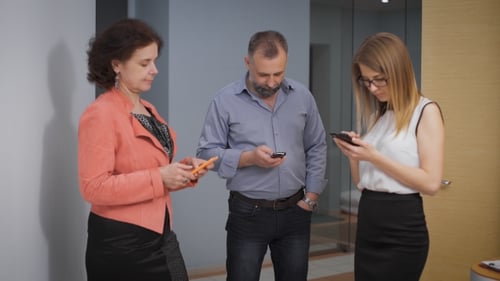 Adults Using Mobile Phones Inside