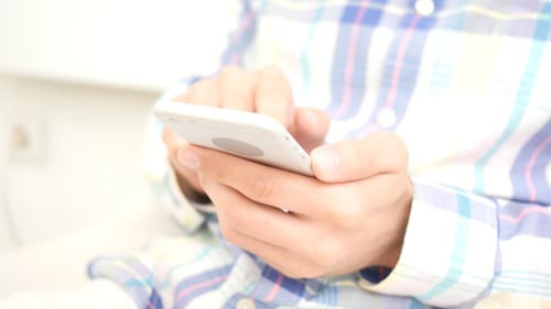 Close Up of Person Using Modern Smartphone
