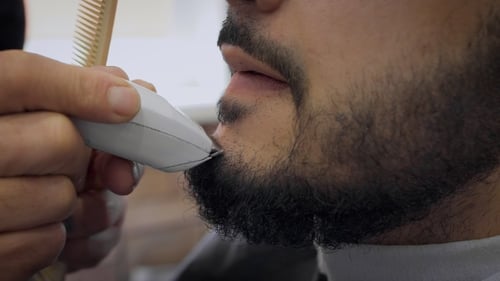 Bearded Man Getting a Precise Beard Trim