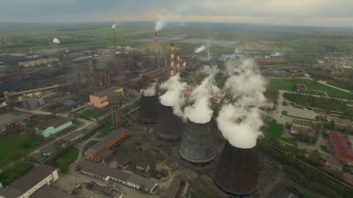 Aerial View of Industrial Plant with Cooling Towers