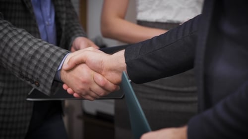 Business Handshake In The Office