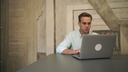 Man Working On The Computer In The Office.