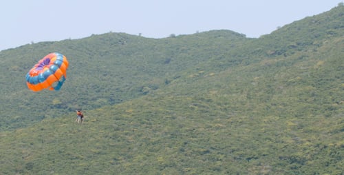 Parasailing Tourists on Vacations