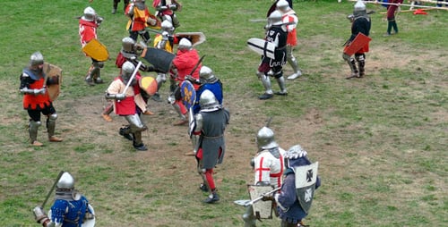 Medieval Knights Battle With Swords and Shields