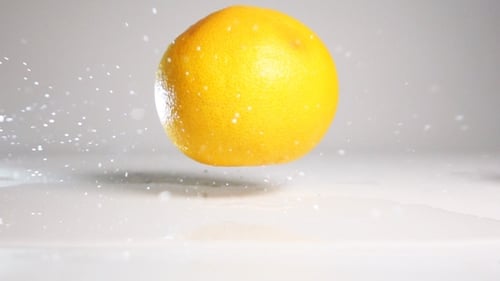 Orange Grapefruit Fall On White Surface