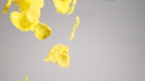 Cornflakes Fall On White Background