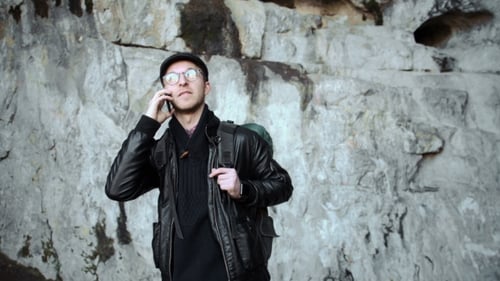 Mountain Trekking - European Man Talking On a Walkie-talkie