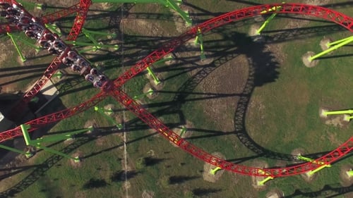 Aerial Shot Of Roller Coaster In Amusement Park