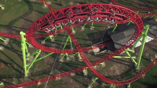 Aerial View Of Loop On Roller Coaster In Amusement Park