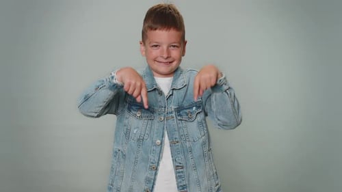 Toddler Kid Boy Pointing Down Saying to Subscribe Gesturing Ok and Like Promotional Advertising