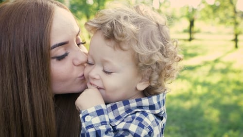 Mother and Child Loving Moment in Park