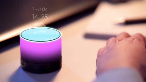 Businesswoman Using Smart Speaker at Office 4