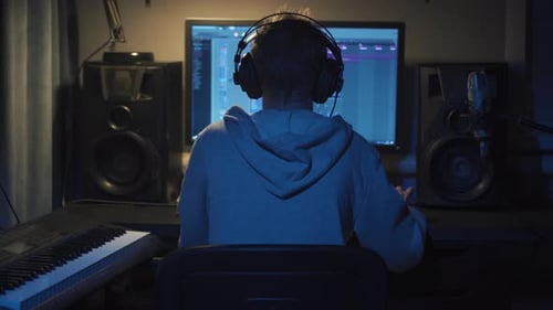 Teenager at Home Composes Music In His Home Sound Studio