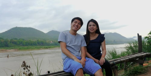Couple Enjoying Tropical River View Together