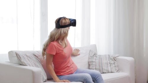 Woman Experiencing Virtual Reality with VR Headset