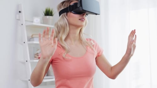 Woman Enjoys Virtual Reality Experience at Home