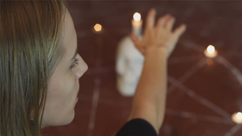 Woman Reading Occult Spell
